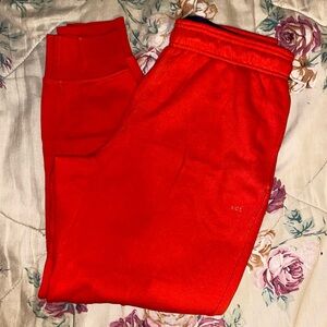 Men’s red Reebok sweatpants